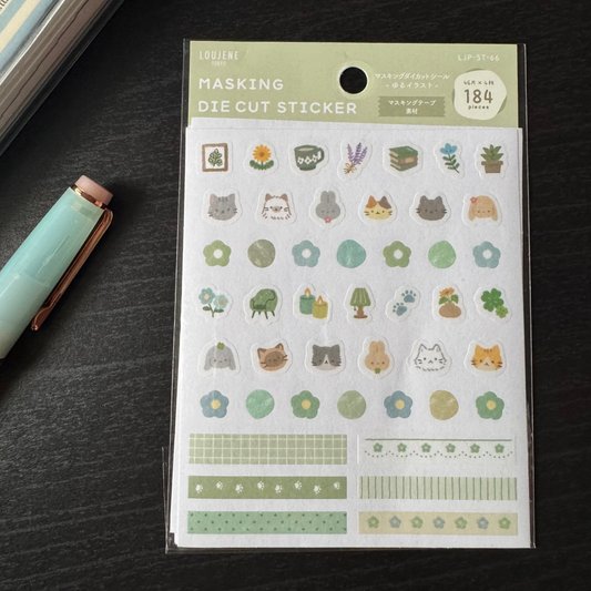 Packaging of a sheet of die-cut stickers with various designs on a dark surface.